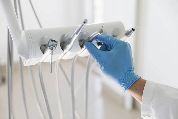 Professional Root Canal Treatment technician working in Warsaw, IL
